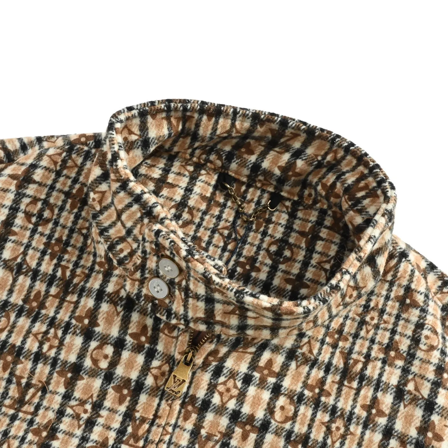 Louis Vuitton jacket with embroidered badges and all-over monogram print.